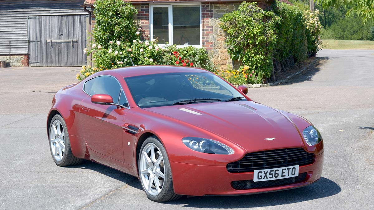 Classic Vintage red Aston Martin at Country Classic Cars